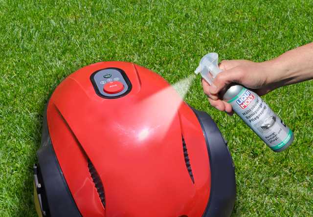 Robotic lawnmower cleaning and care spray